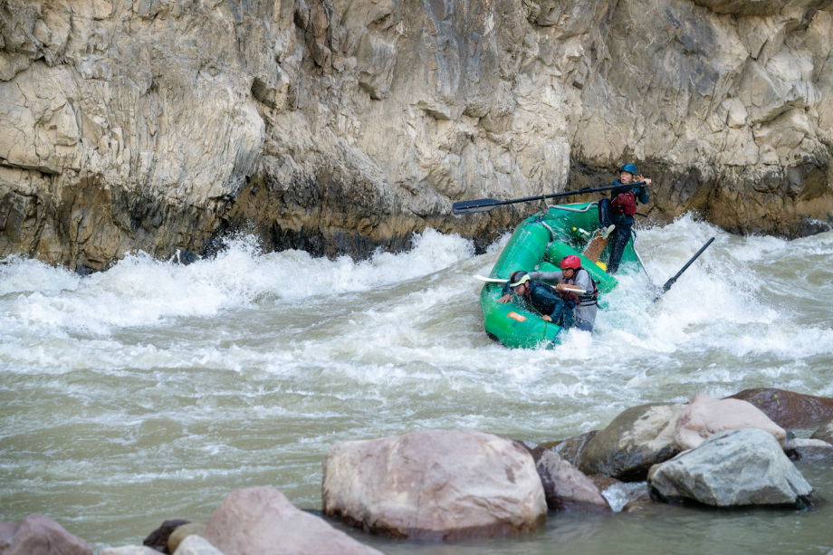 Knook and others wading down rapids during trip Vera Knook Paddlers The River Collective Paddling